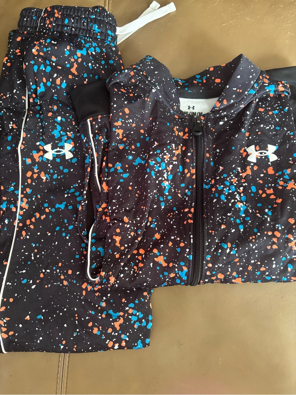 Under Armour Kids Black Jacket & Pants Set with Blue and Orange Splatter